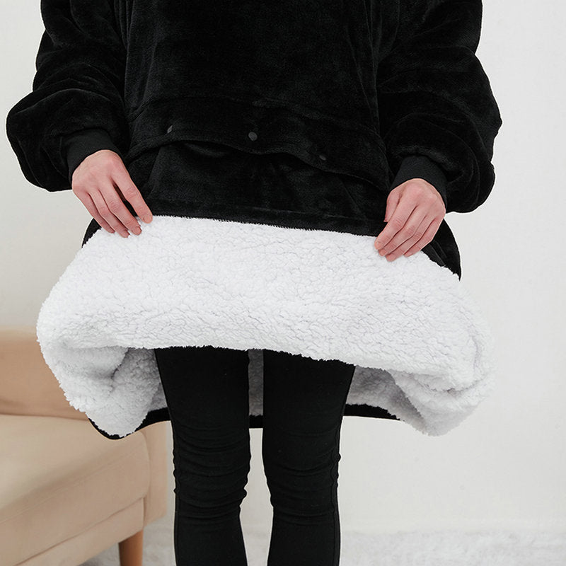 Inside of the Hoodgrove hoodie blanket, showing the thick white sherpa lining